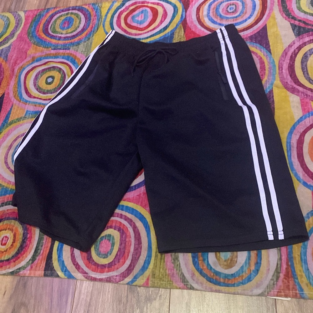 Black shorts with white stripes